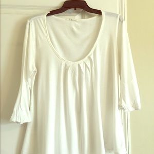 Scoop neck, pleated front shirt with 3/4 sleeve